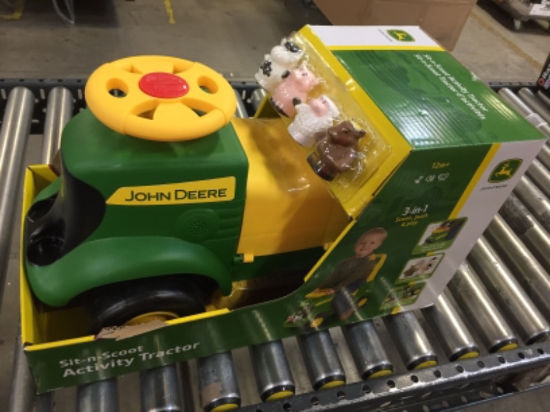 Photo 1 of John Deere Sit N Scoot Activity Tractor - Green