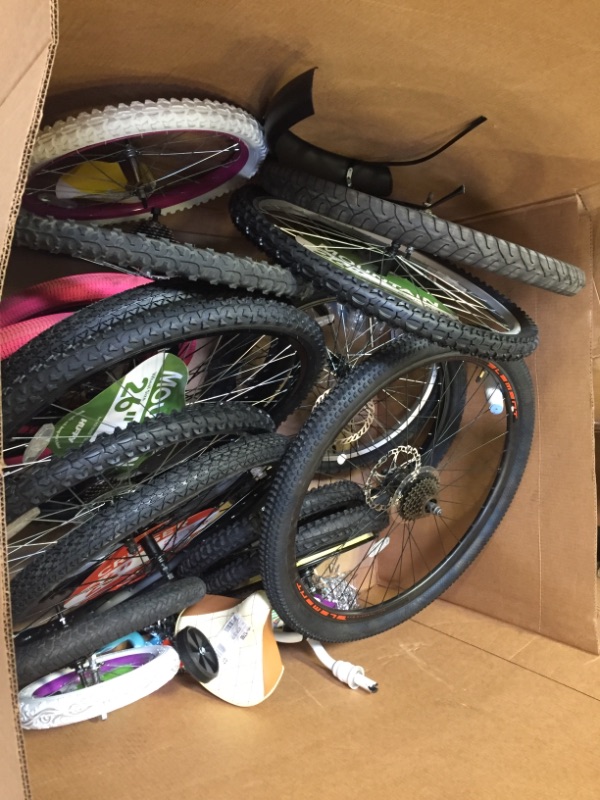 Photo 2 of 17 ASSORTED BIKE TIRES AND WHEELS. MULTIPLE COLORS SIZES AND STYLES. A COUPLE HANDLE BARS. SOME NEW SOME USED. SOME DAMAGED SOME NOT 