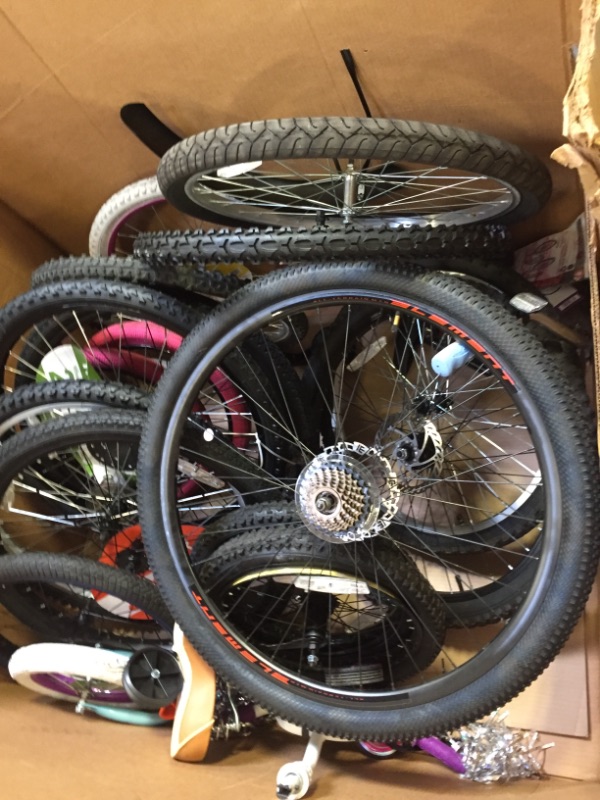 Photo 3 of 17 ASSORTED BIKE TIRES AND WHEELS. MULTIPLE COLORS SIZES AND STYLES. A COUPLE HANDLE BARS. SOME NEW SOME USED. SOME DAMAGED SOME NOT 