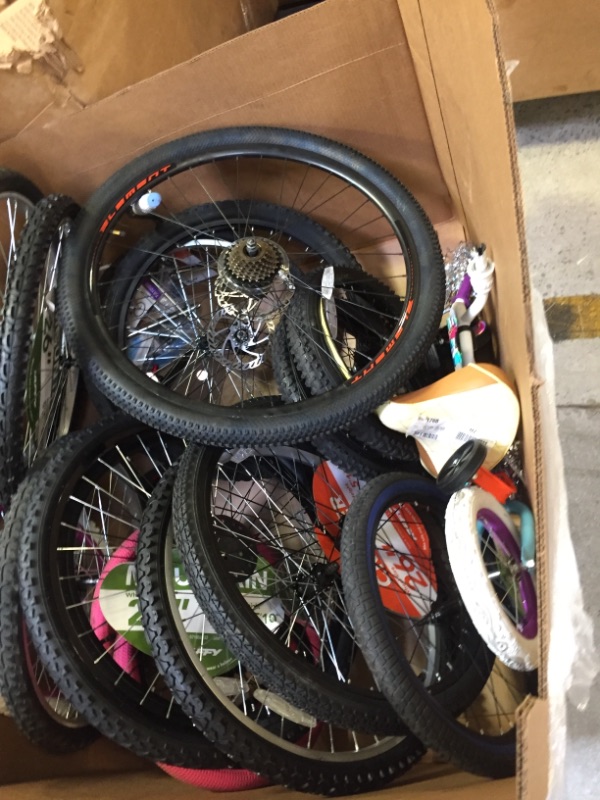 Photo 4 of 17 ASSORTED BIKE TIRES AND WHEELS. MULTIPLE COLORS SIZES AND STYLES. A COUPLE HANDLE BARS. SOME NEW SOME USED. SOME DAMAGED SOME NOT 