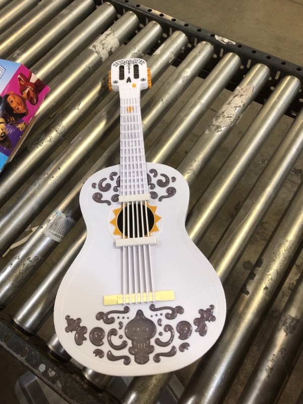 Photo 1 of Disney/Pixar Coco Guitar, Playable Musical Toy with Chord Chart, Approx 25-in (63.5-cm) Long for Kids Ages 3 Years Old & Up [Amazon Exclusive]
