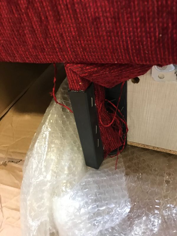 Photo 1 of Damaged Red Futon 