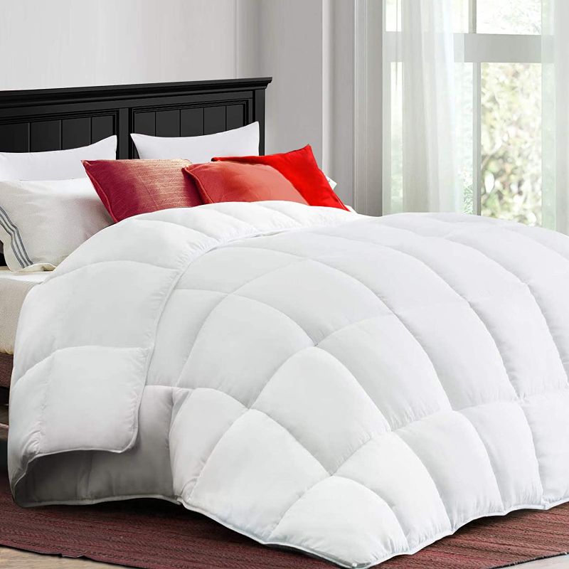 Photo 1 of COONP All Season King Comforter Cooling Down Alternative Quilted Duvet Insert with Corner Tabs,Winter Warm Hotel Comforter,Machine Washable-102 x 90 Inches,White
