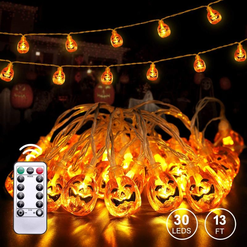 Photo 1 of Halloween Pumpkin String Lights - YUNLIGHTS 13ft 30 LED Halloween 3D Pumpkin Lights with 8 Lighting Modes, Waterproof Battery Operated Halloween Lights with Remote for Outdoor Indoor Decoration
