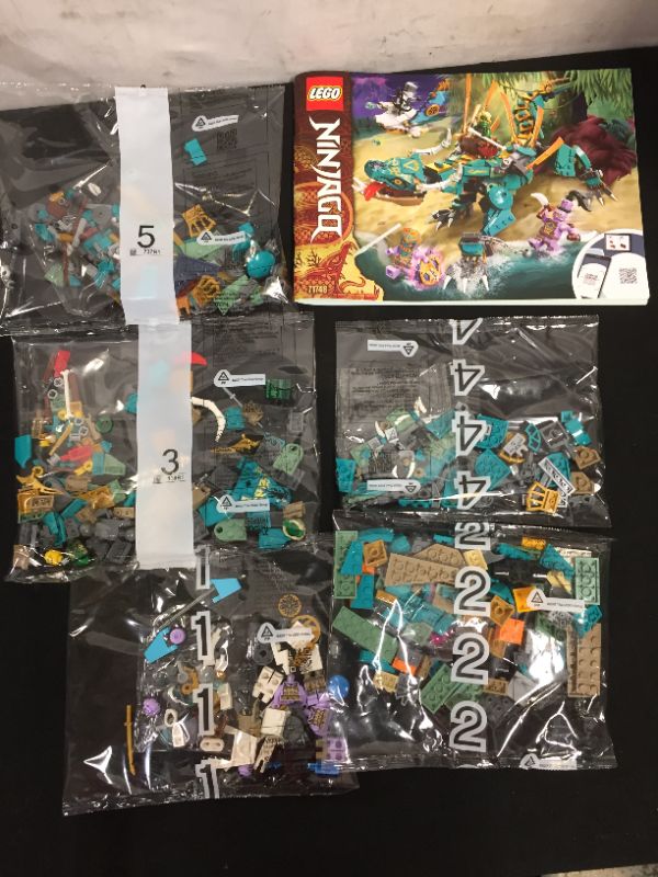 Photo 2 of LEGO NINJAGO Jungle Dragon 71746 Building Kit; Ninja Playset Featuring Posable Dragon Toy and NINJAGO Lloyd and Zane; Cool Toy for Kids Who Love Imaginative Play, New 2021 (506 Pieces)
