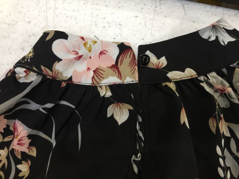 Photo 2 of womens shirt sleeveless color black flower themed size medium 