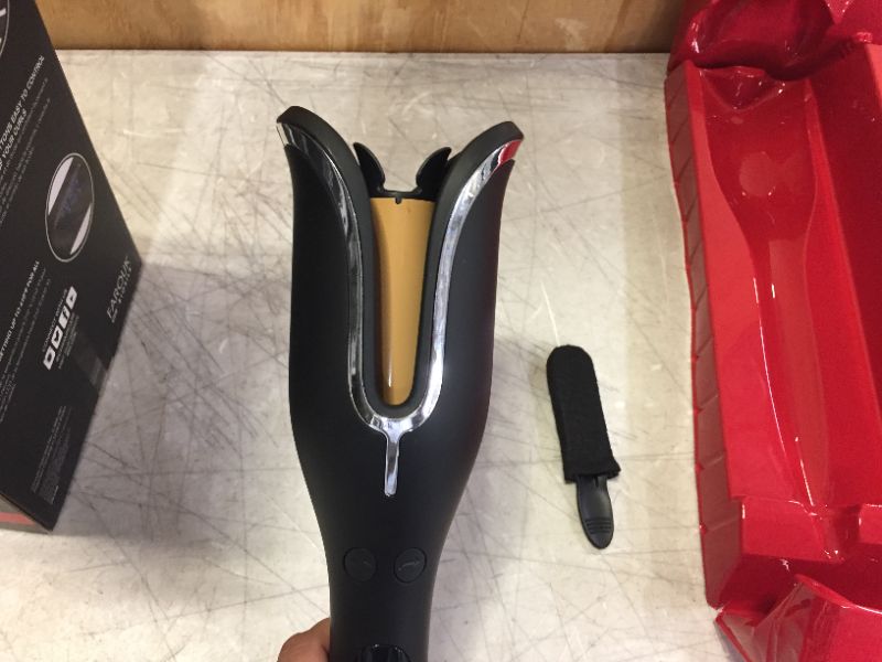 Photo 1 of CERAMIC ROTATING CURLER 1"