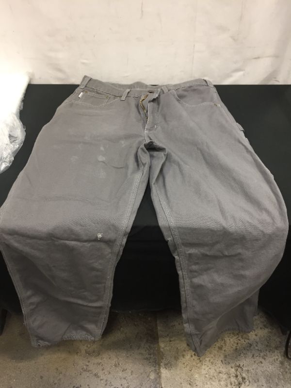 Photo 1 of carhartt grey jeans size 36x36 ****chlorine stains****