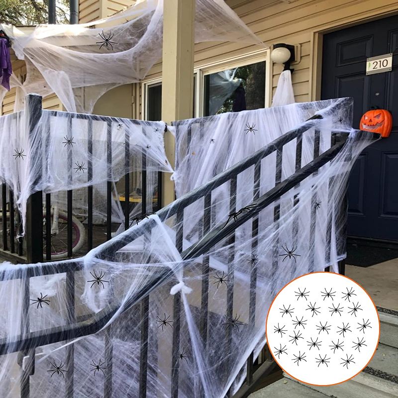 Photo 1 of AJDSK Halloween Decorations Spider Web 1400 Sqft with 200 Fake Spiders, Large Halloween Outdoor Indoor Party Yard Decor Supplies for Bar Haunted House Clearance
