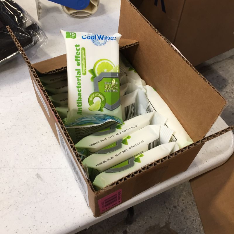 Photo 1 of 12 pack of sanitizing wipes, 15 wipes each. lime by cool wipes