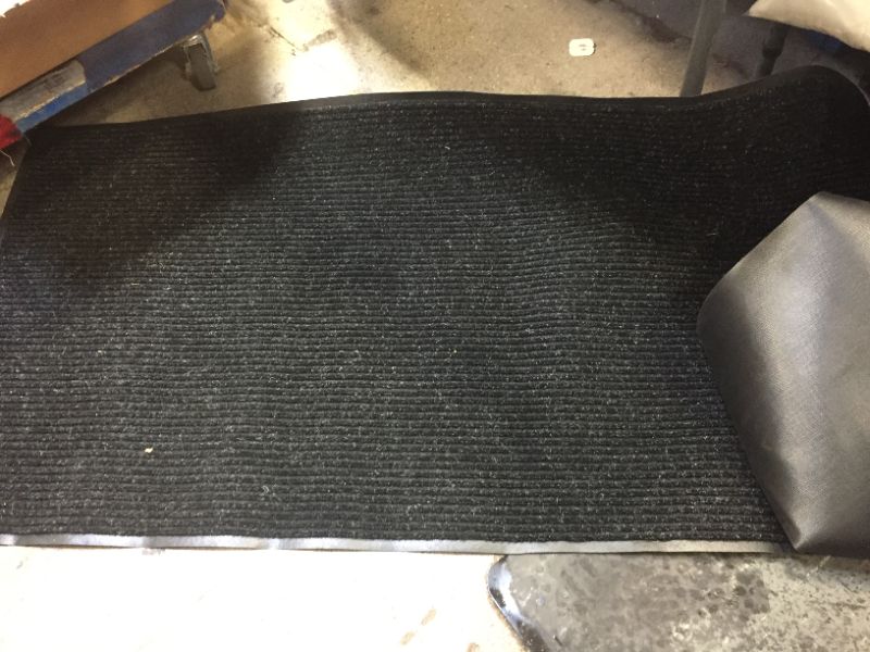 Photo 3 of dirty Notrax 109 Brush Step Entrance Mat, 3' x 10', Charcoal (109S0310CH)