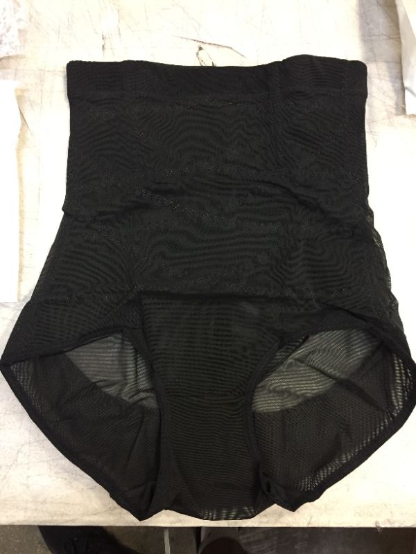 Photo 1 of 5 pack of women's clothing, 4 pairs of underwear 3 pairs 2xl cheekless underwear one XL high waisted underwear and one pair of small leggings,