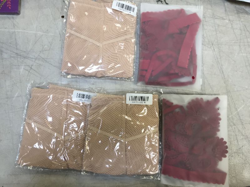 Photo 1 of 5 pack of women's clothing, 2 size small red bralettes and 3 pairs of cheekless underwear