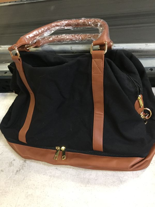 Photo 1 of WOMENS LARGE TRAVEL BAG BLACK WITH BROWN TRIMMING 