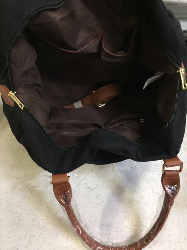 Photo 2 of WOMENS LARGE TRAVEL BAG BLACK WITH BROWN TRIMMING 