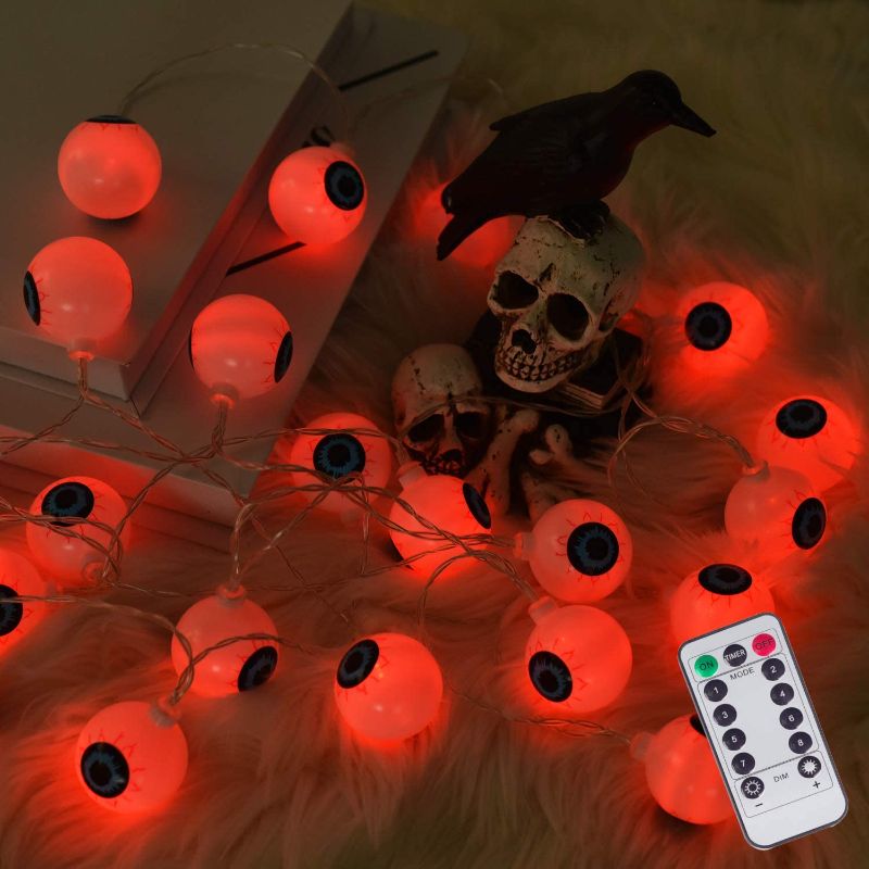 Photo 1 of ILLUMINEW 30 LED Halloween Eyeball String Lights, 8 Modes Fairy Lights with Remote, Waterproof Battery Operated Halloween Lights for Outdoor Indoor Party Christmas Halloween Decoration(Red) 16FT
