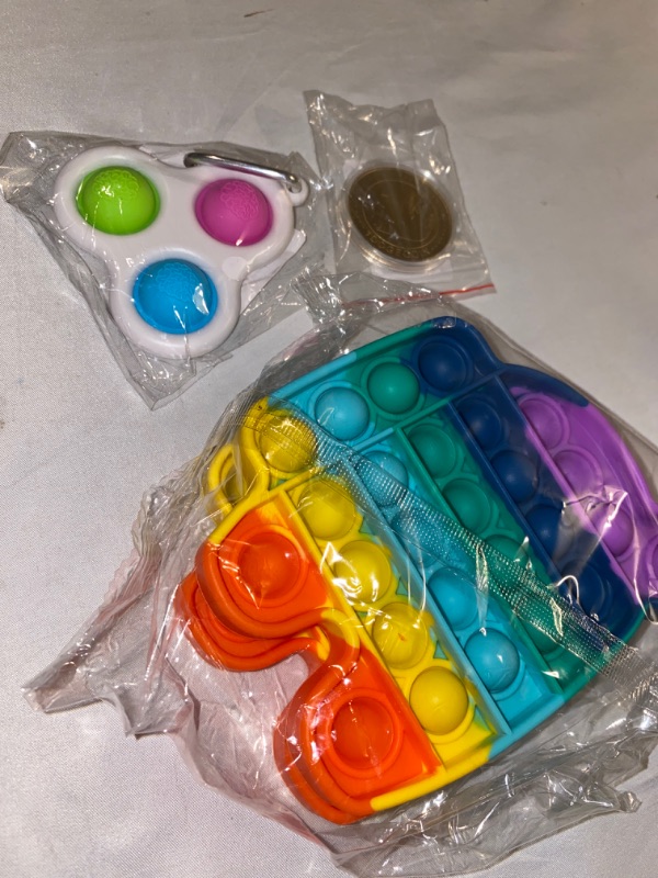 Photo 4 of 3PC LOT
2 Packs Rainbow Pop Bubble Fidget It Sensory Fidget Toy Push Bubble,Squeeze Silicone Toy

Taymey 2021 mini simple dimple keychain fidget toy Simple Dimple Sensory Fidget Toys Mini Stress Reliever Hand Toys Keychain Toy Anxiety Stress Relief Office