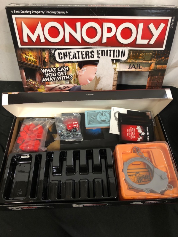 Photo 3 of Monopoly Cheaters Edition Board Game
