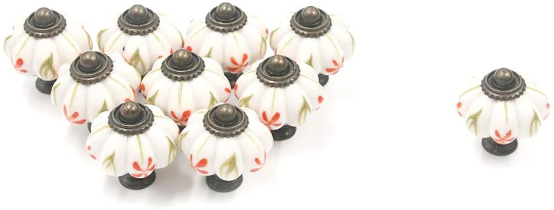 Photo 1 of Cabinet Knobs Mcredy Pumpkin Handle Single Hole Round Ceramic Safflower Yellow Leaves 1.5x1.3"(HxD)10 Pack
