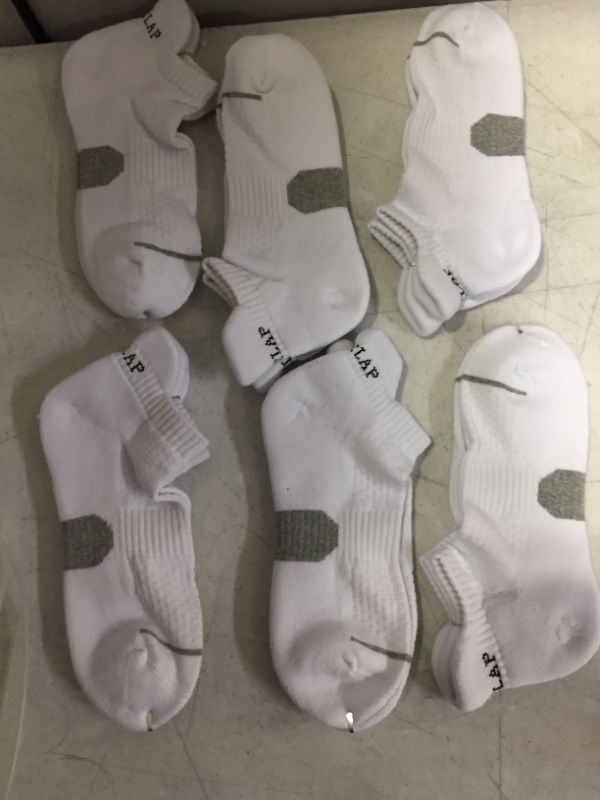 Photo 1 of means low sock 6 pairs 
size unknow 