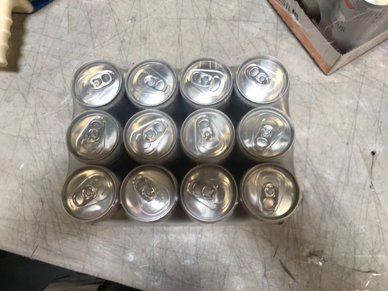 Photo 2 of Celsius Peach Mango Green Tea - 12 pack, 12 fl oz cans EXP 12/22
