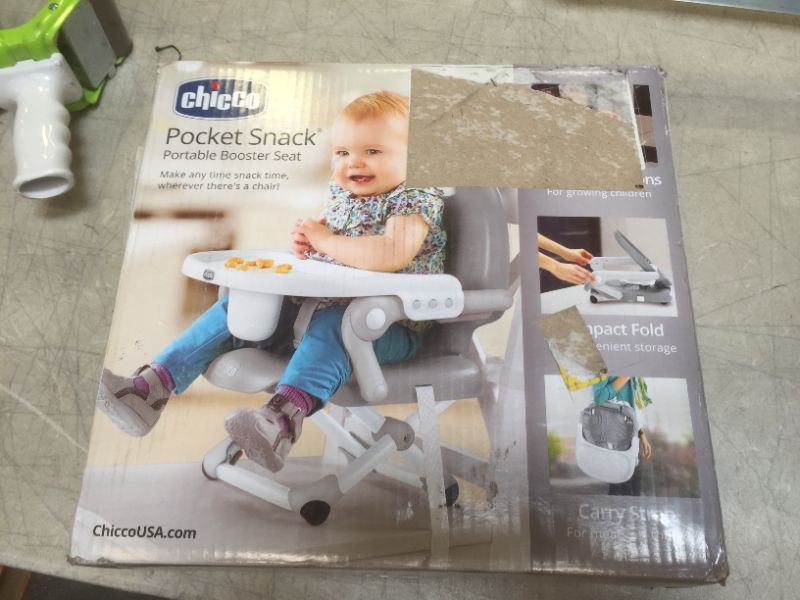 Photo 1 of Chicco Portable Dining Chair Toddler Booster Seat with Tray, Gray