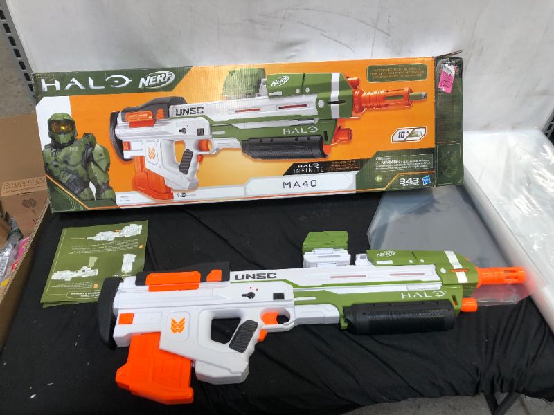 Photo 2 of NERF Halo MA40 Motorized Dart Blaster -- Includes Removable 10-Dart Clip, 10 Official Elite Darts, and Attachable Rail Riser , White
