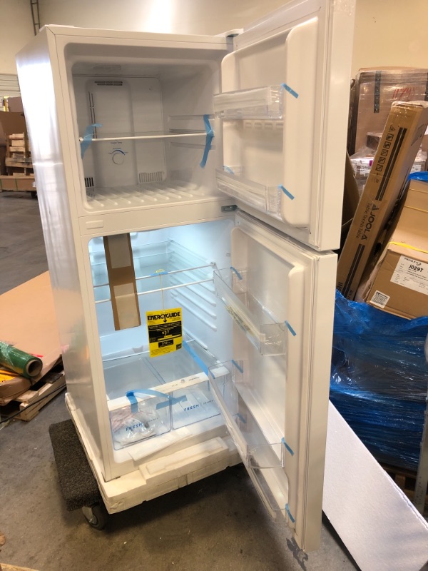 Photo 1 of Frigidaire 11.6 Cu. Ft. Compact ADA Top Freezer Refrigerator in White with Electronic Control Panel, Reversible Door Swing,
Item Dimensions LxWxH	28.75 x 23.75 x 59.88 inches