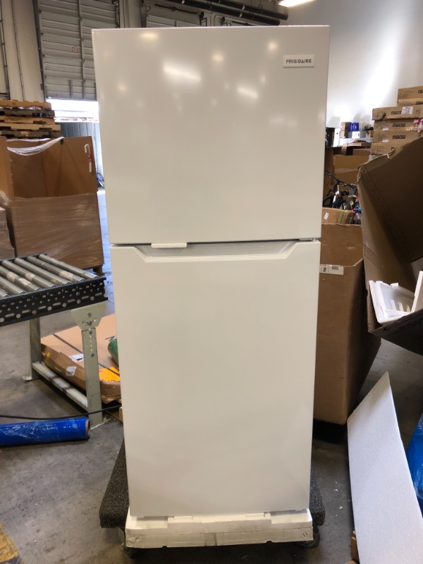 Photo 1 of Frigidaire 11.6 Cu. Ft. Compact ADA Top Freezer Refrigerator in White with Electronic Control Panel, Reversible Door Swing,
Item Dimensions LxWxH	28.75 x 23.75 x 59.88 inches