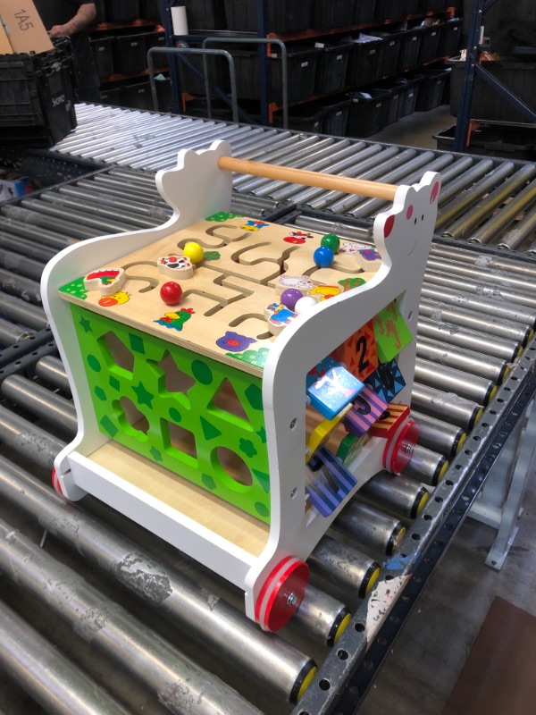 Photo 1 of BABY DEVELOPMENTAL TOY ON WHEELS.