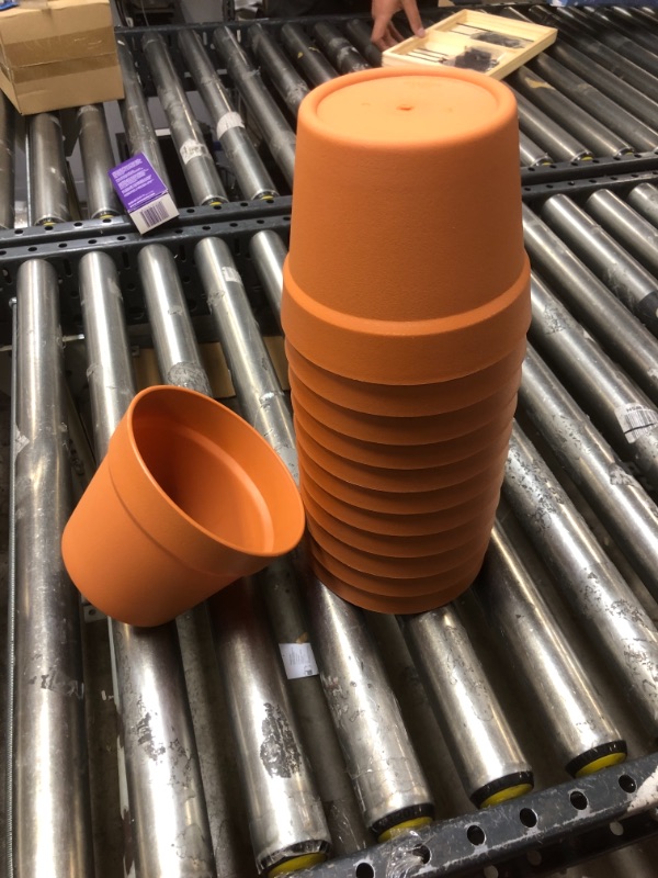 Photo 1 of 6 INCH TALL ORANGE POTS FOR PLANTS. 12PACK