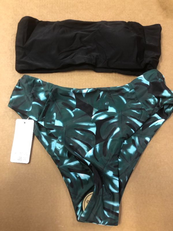 Photo 1 of WOMEN'S BATHING SUIT SIZE MEDIUM