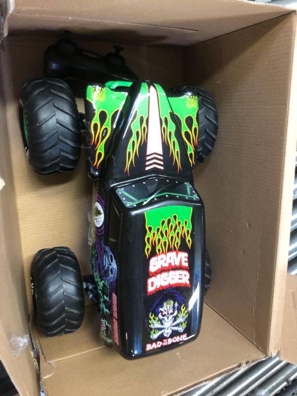 Photo 2 of Monster Jam, Official Grave Digger Remote Control Truck 1:15 Scale, 2.4GHz (needs batteries)