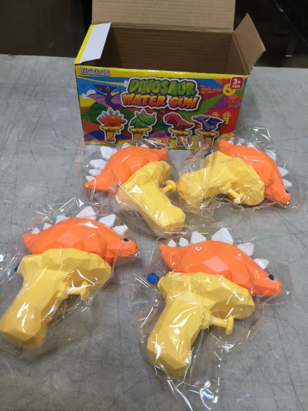 Photo 2 of 4 pc dinosaur watergun-- stegosaurus 