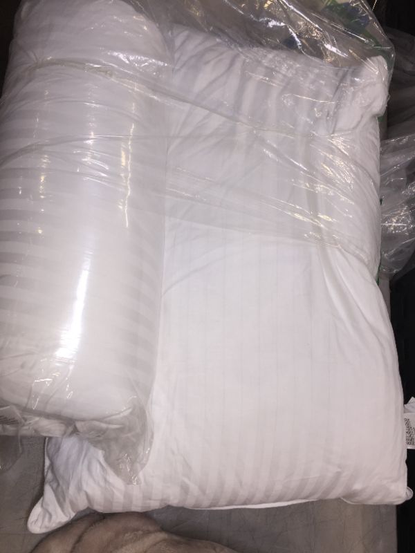 Photo 1 of 2 pk pillows white / one pillow open not used 