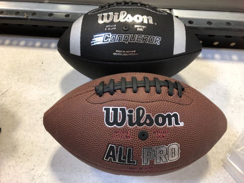 Photo 2 of 2 pcs Wilson Football----new need more air
