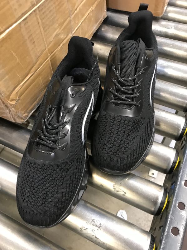 Photo 1 of CASE OF 7 PAIRS SIZE 44 BLACK RUNNING SHOES 