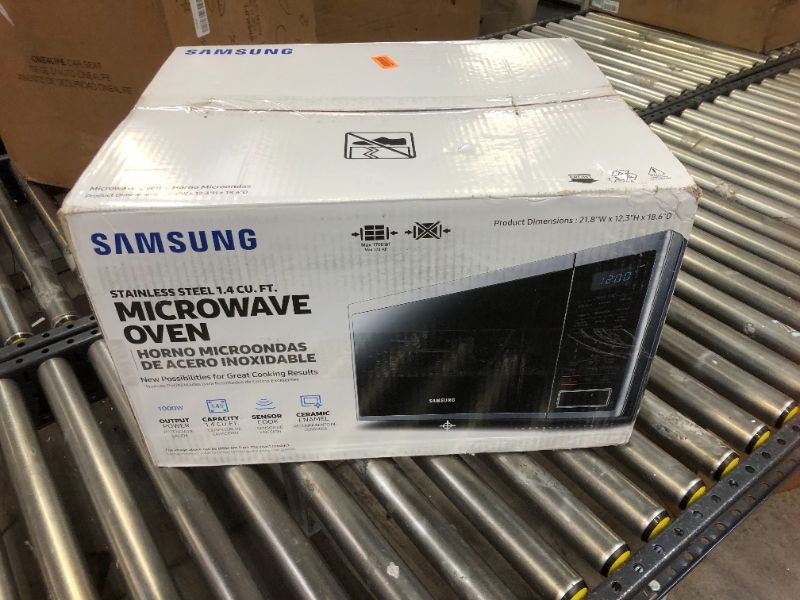 Photo 6 of 1.4 cu. ft. Countertop Microwave with Sensor Cooking in Stainless Steel
