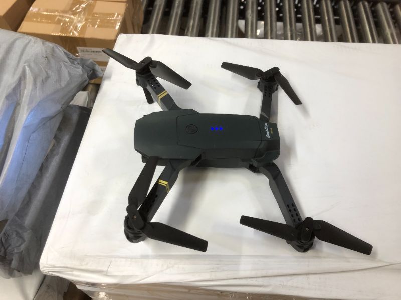 Photo 2 of 2.4gz Quadcopter Drone WiFi Enable Smart Drone - unable to operate in facility due to employee safety regulations, but It does work, please trust me. Also does not come with batteries. 
