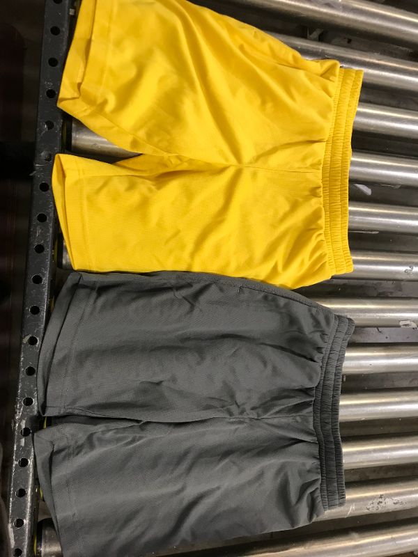 Photo 1 of Boys Basketball shorts size medium grey and yellow