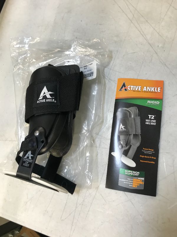 Photo 2 of Active Ankle T2 Ankle Brace, Black Ankle Support for Men & Women, Ankle Braces for Sprains, Stability, Volleyball, Cheerleading, medium