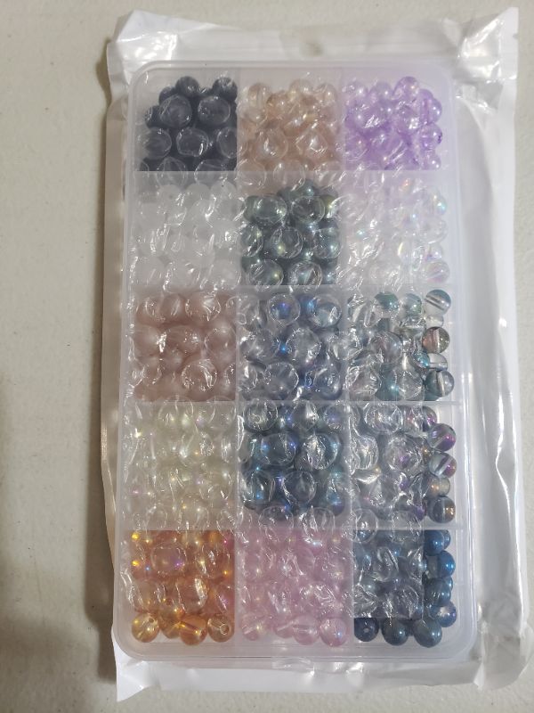 Photo 2 of ASSORTED GLASS BEAD KIT FOR CRAFTING.