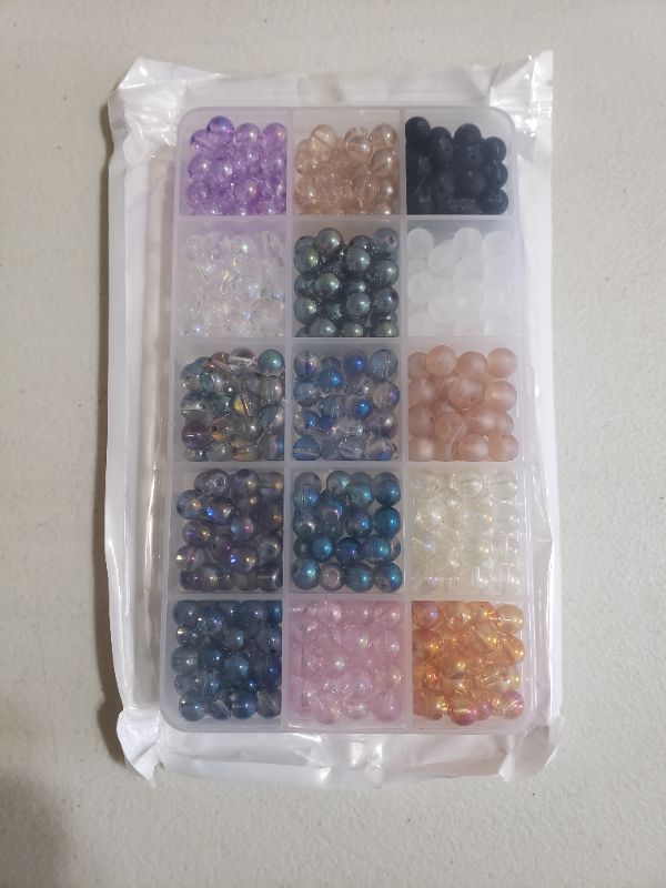 Photo 1 of ASSORTED GLASS BEAD KIT FOR CRAFTING.