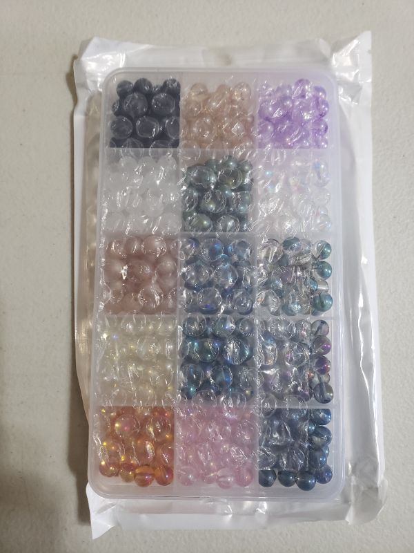 Photo 2 of ASSORTED GLASS BEAD KIT FOR CRAFTING.