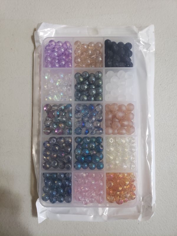 Photo 1 of ASSORTED GLASS BEAD KIT FOR CRAFTING.