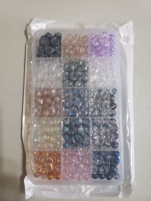 Photo 1 of ASSORTED GLASS BEAD KIT FOR CRAFTING.