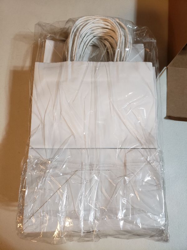 Photo 1 of 50 COUNT WHITE CRAFTING OR GIFTING BAGS.