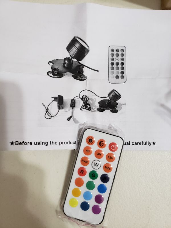 Photo 2 of LED MINI SPOTLIGHT WITH REMOTE, MULTI-COLORED.