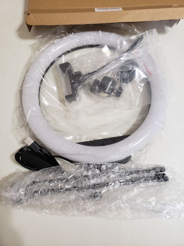 Photo 1 of LED RING LIGHT COMPATIBLE WITH IPHONE AND ANDROID.