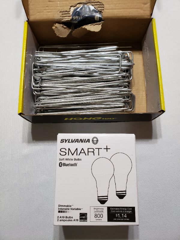 Photo 1 of 6 X 1 INCH LARGE STAPLES & SYLVANIA SMART SOFT WHITE BULBS, LOT OF 2 ITEMS.